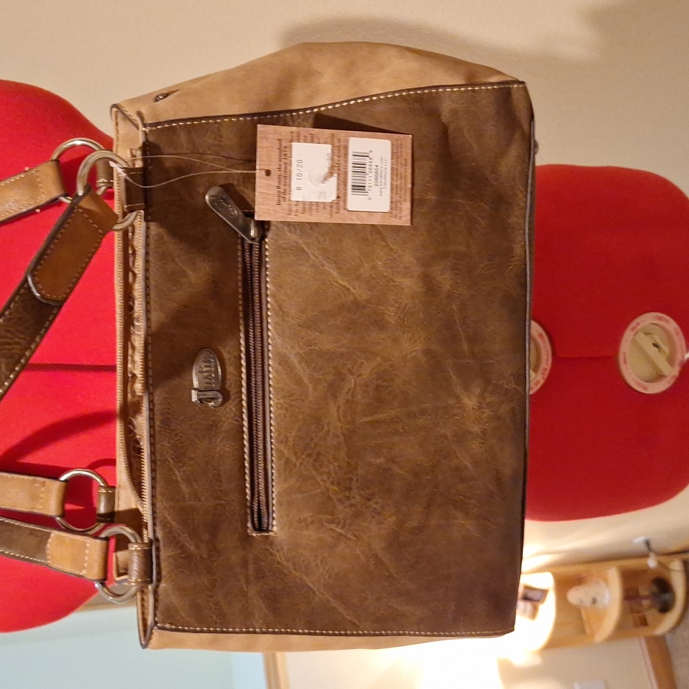 Justin Purse - Picture 3 of 16